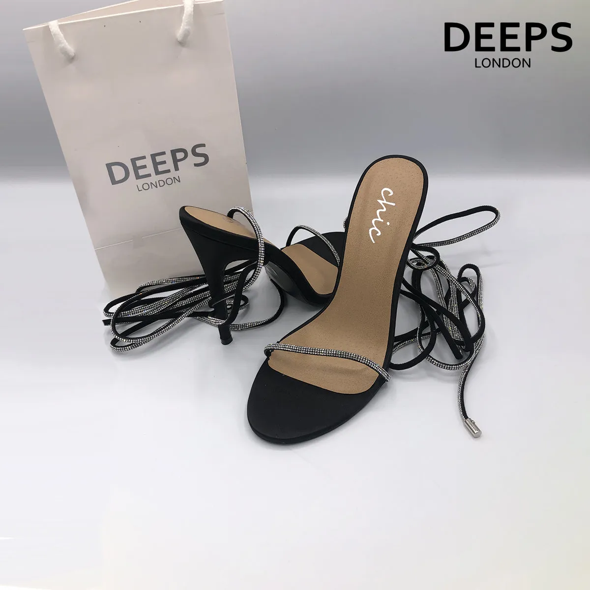 NOMI SATIN RHINESTONE LACE-UP HEELS BLACK